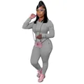 Close-up of grey long-sleeve hooded tracksuit with matching drawstring pants and zip pockets - S / Top And Bottom / Gray