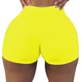 Détail de short de yoga taille haute jaune fluo pour femme avec une coupe sexy serrée - Jaune