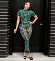 Full body view of a women's sexy palm leaf print see-through mesh jumpsuit outfit - Green Tropical Print