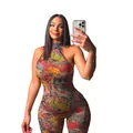Sexy floral print mesh backless jumpsuit worn by a woman taking a mirror selfie - S / Top And Bottom (D9540) / Colorful Floral Prints
