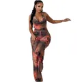 Close-up showing the intricate leopard and red floral print on this halter neck jumpsuit - S / Top And Bottom / Brown Leopard