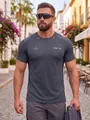 Detailed shot of breathable mesh fitness t-shirt with athletic logo and pattern - M / Tops / Gray