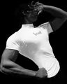 Close-up of white compression t-shirt showing muscle fit and chest graphic print - S / Tops / White