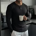 Black ribbed long sleeve muscle fit Henley shirt with half-button collar for men - S / Tops / Black