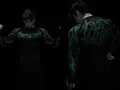 Macro view of men's black compression gym shirt featuring green lightning patterns - S / Tops / Black With Green Accent