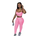 Pink two-piece sports set featuring a camisole crop top and high-waisted skinny leggings - S / Top And Bottom / Pink