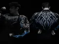 Men's fitness compression shirt with blue skull graphic and lightning patterns - Black With Blue Accent