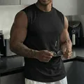 Men's black muscle tank top for fitness and outdoor running, breathable mesh fabric. - Black