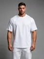 Detaillierte Ansicht des weißen übergroßen Fitness-T-Shirts für Herren aus Baumwolle - S / Oberteile / Weiß