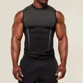 Close-up detail of men's compression fitness tank top featuring a grey textured chest panel - S / Tops / Black and Gray