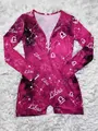 Detail of Libra zodiac galaxy print on magenta long sleeve home romper jumpsuit - Libra