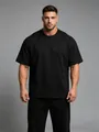 Nahaufnahme des schwarzen Oversized-Sport-T-Shirts für Herren mit lockerer Passform - S / Oberteile / Schwarz