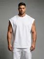 Detailed view of white cotton sleeveless fitness muscle tank top for athletic men - S / Tops / White