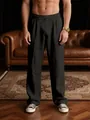 Detail of men's loose straight black trousers with breathable fabric and drawstring waist - S / Bottoms / Black