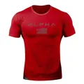 Close-up detail of the printed front design on a red athletic t-shirt with ALPHA text - M / Tops / Red