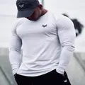Maglia sportiva attillata a maniche lunghe da uomo grigio chiaro per bodybuilding - Taglia M / Top / Bianco