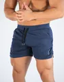 Leistungsstarke marineblaue Mesh-Laufshorts für Herren mit elastischem Kordelzug am Bund - M / Unterteile / Marineblau