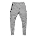 Close-up detail of men's grey cargo joggers showing multi-pockets and ankle zippers - M / Bottoms / Medium Grey
