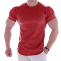 Close-up of men's red muscle fit athletic T-shirt for gym workout and fitness training. - M / Tops / Red