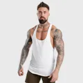 Professional close-up of a white muscle-fit stringer tank top on a fit male model - M / Tops / White