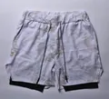 Men's double-layered athletic shorts featuring white and beige camouflage pattern design - M / Bottoms / Light White Camouflage