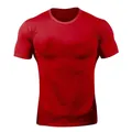 Close-up view of red men's athletic compression t-shirt showing slim muscle fit - M / Tops / Red