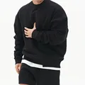 Sudadera negra de cuello redondo para hombre, estilo oversize con hombros caídos. - M / Tops / Negro