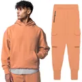 Detailed view of premium men's apricot cotton hoodie and matching cargo pants tracksuit set. - S / Top And Bottom / Orange