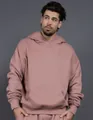 Close-up of oversized mauve hoodie with heavyweight fleece lining and dropped shoulder design - S / Tops / Pink