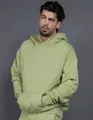 Detail of a sage green 400G heavyweight oversized fleece hoodie with drop shoulders. - S / Tops / Fruit Green