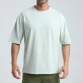 Oversized men's cotton crew neck T-shirt with side slits in light mint green - Light Green