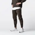 Schmal geschnittene braune Herren-Fleece-Jogginghose mit elastischen Bündchen für die Freizeit - Braun