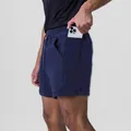 Detail of side pocket on navy blue men's sports shorts showing smartphone storage - Navy Blue