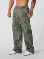 Loose fit men's street style joggers featuring a realistic digital forest camouflage print - S / Bottoms / Green Camo