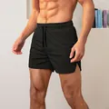 Men's breathable quick-dry athletic shorts in solid black for gym fitness and running - XS / Bottoms / Black