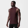 Side view of a muscular man wearing a burgundy gym tank top with wide armholes. - S / Tops / Burgundy