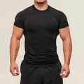 Men's black quick-dry compression t-shirt for bodybuilding and intense gym training - S / Tops / Black