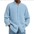 Detail view of light blue waffle knit texture on this men's casual long sleeve shirt. - Light Blue
