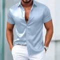 Detailed view of men's light blue shiny satin short sleeve shirt for casual clubwear outfit - Azure Blue