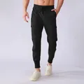 Men's black quick-dry sports cargo pants with multi-pockets and tapered drawstring - S / Bottoms / Black