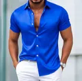 Close-up of men's royal blue shiny satin short-sleeve shirt with button-down detail - Sky Blue