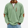 Macro view of green corduroy half-zip sweatshirt featuring distinct brown elbow patches - S / Tops / Light Green