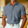 Detail showing the texture and fit of the grey waffle knit short sleeve polo shirt. - S / Tops / Teal