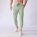 Men's light green quick-dry athletic cargo joggers with drawstring and multiple pockets - Fruit Green