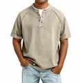 Close-up detail of men's vintage washed cotton Henley short sleeve shirt in khaki - Khaki