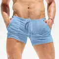 Close-up detail of men's light blue breathable ultra-thin drawstring shorts with pockets - 3XL / Bottoms / Light Blue