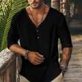 Detail view of men's black linen texture long sleeve V-neck beach shirt with buttons - S / Tops / Black
