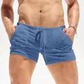 Close-up of men's blue breathable ultra-thin drawstring casual shorts with pockets - 3XL / Bottoms / Navy Blue