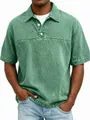 Detail of a men's vintage wash green polo shirt featuring a classic collar and buttons - Light Green