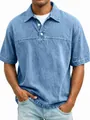 Vorderansicht von hellblauem Polohemd für Herren mit verwaschenem Denim-Effekt und Knöpfen - Blau